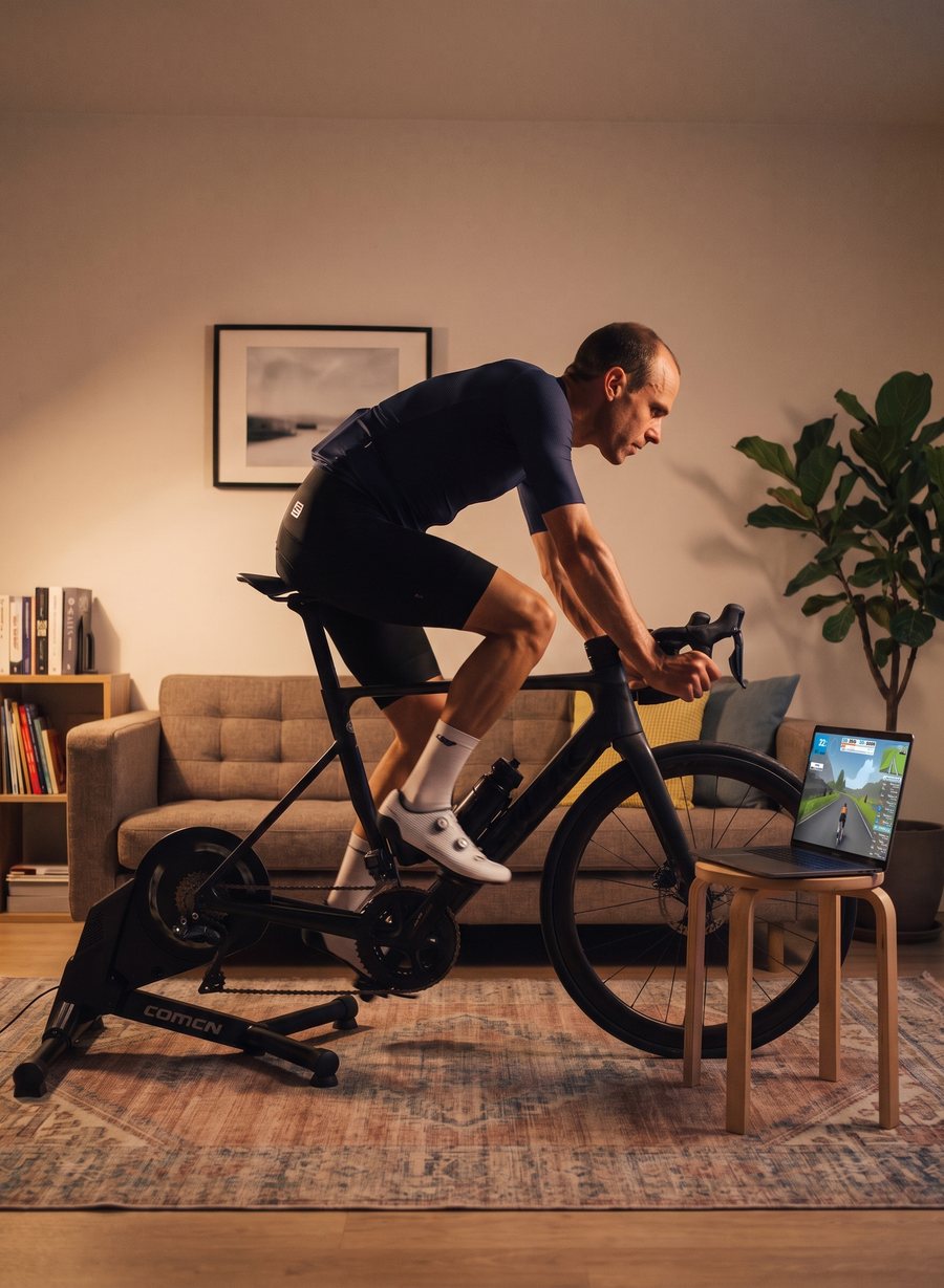 Cyclist testing alone at home on a smart trainer