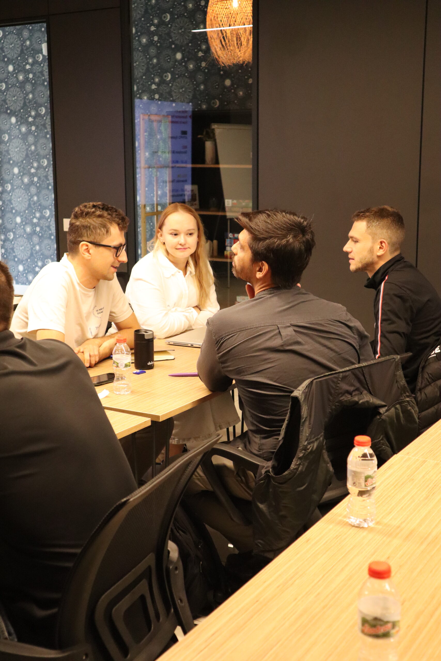 Coaches reviewing metabolic profiles during the workshop
